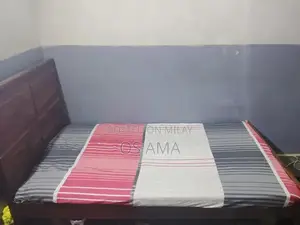 Photo - Single Bed Frame with Minor Wear