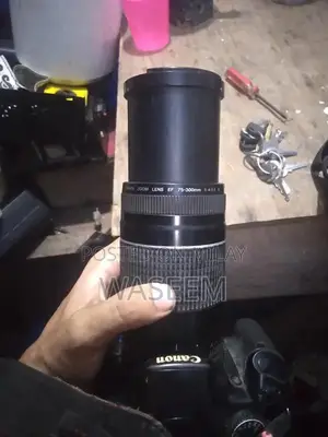 Photo - Canon 450D DSLR Camera with EF-S 75-300mm Telephoto Lens