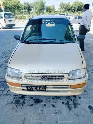 Photo - 2011 Daihatsu Coure Compact Car with Air Conditioning