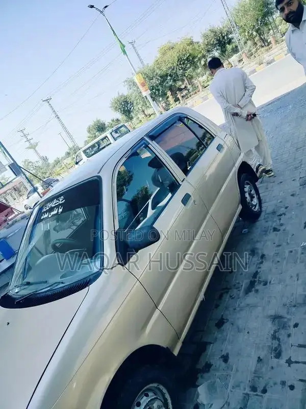 2011 Daihatsu Coure Compact Car with Air Conditioning