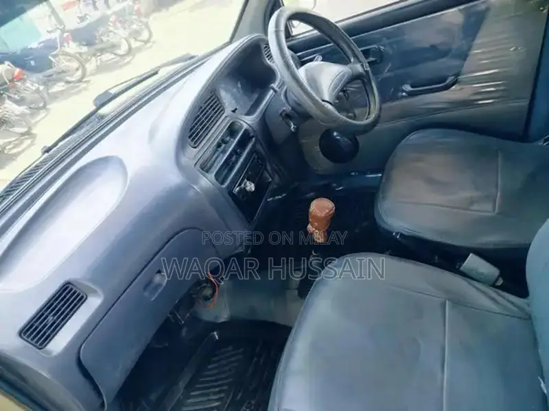 2011 Daihatsu Coure Compact Car with Air Conditioning