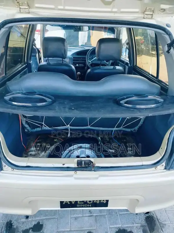 2011 Daihatsu Coure Compact Car with Air Conditioning