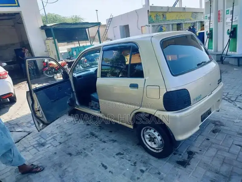 2011 Daihatsu Coure Compact Car with Air Conditioning