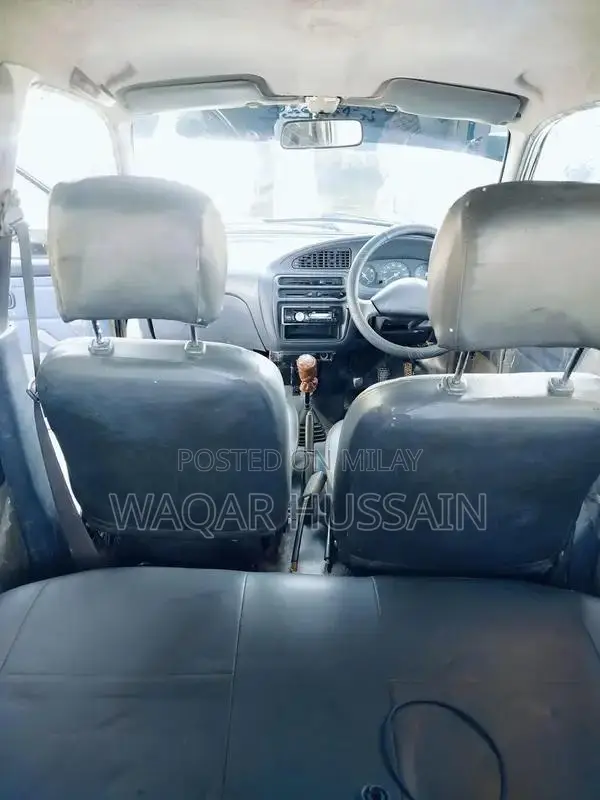 2011 Daihatsu Coure Compact Car with Air Conditioning