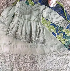 Pistachio Green Crape Silk Lehnga Choli Set with Cut Dana Work