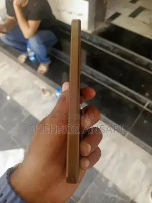 Well-Maintained Smartphone with Charger