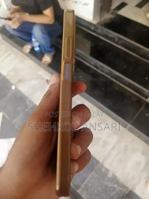 Well-Maintained Smartphone with Charger