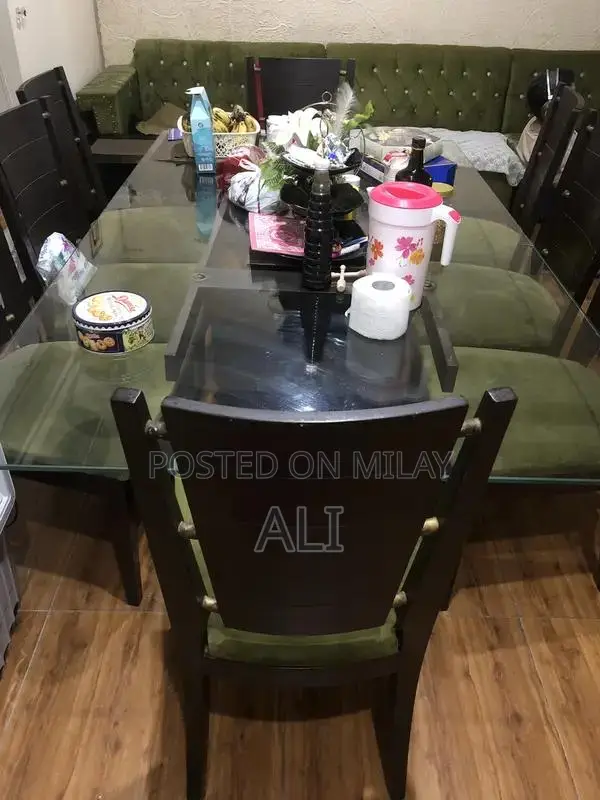 Dining table with 8 chairs .