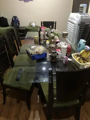 Dining table with 8 chairs .