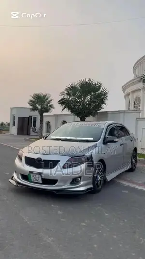 Photo - 2009 Toyota Corolla Sedan with Modified Lights and Original Interior