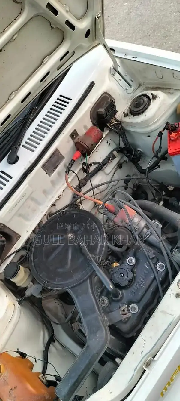 Mehran Car - Well Maintained Sedan with Partial Paint and Good Conditi