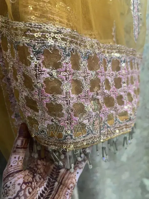 Women's Embroidered Dupatta Sharara Ensemble with Detailed Embellishme