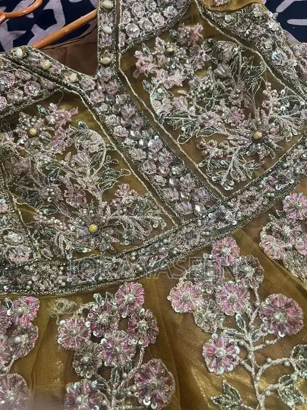 Women's Embroidered Dupatta Sharara Ensemble with Detailed Embellishme