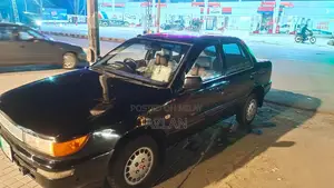 Photo - 1989 Mitsubishi Lancer Manual Transmission Sedan