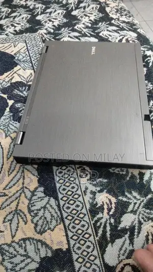 Photo - Dell Core i5 Laptop with 4GB RAM and Original Charger