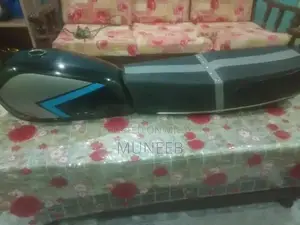 Photo - Motorcycle Carburetor Chain Cover and Seat Component