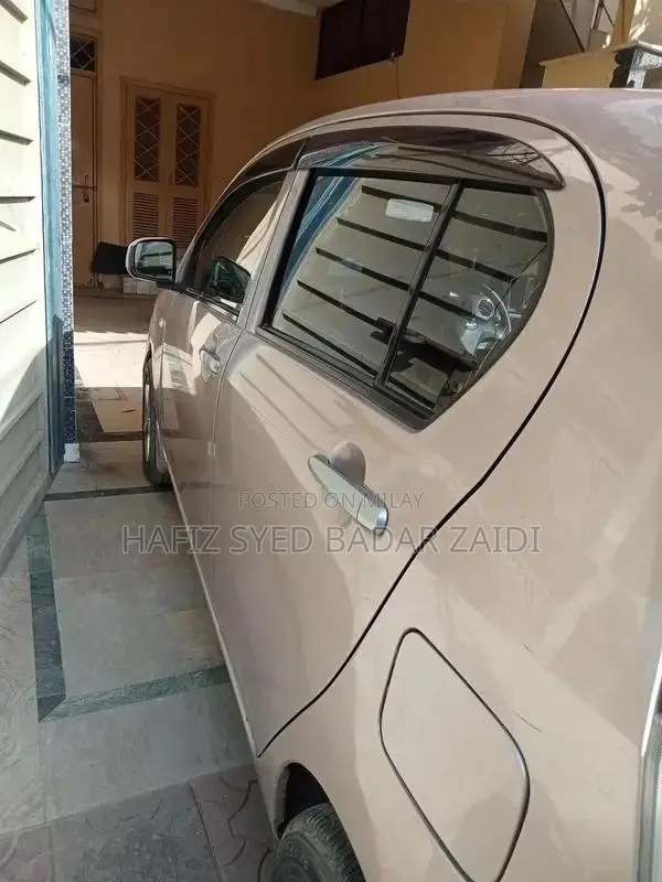 Daihatsu Mira Elegant Rose Metallic Compact Car