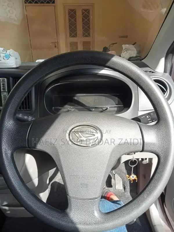 Daihatsu Mira Elegant Rose Metallic Compact Car