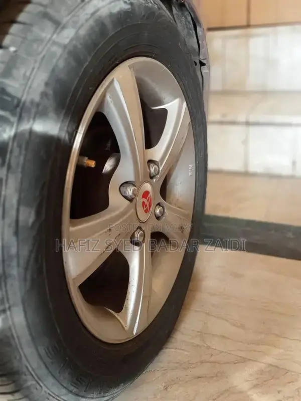 Daihatsu Mira Elegant Rose Metallic Compact Car