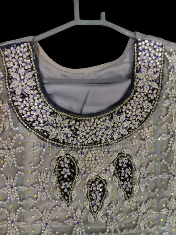 Silver Bridal Dress with Elaborate Dabka and Stone Embellishments