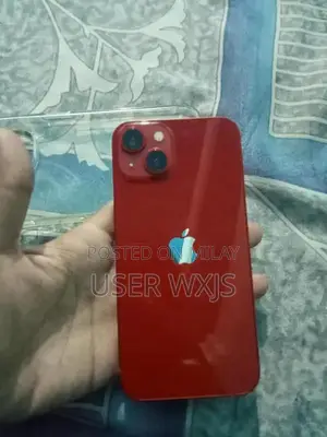 Photo - Apple iPhone 13 Red Smartphone with High Battery Health