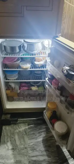Photo - Compact Medium-Sized Refrigerator in Excellent Condition