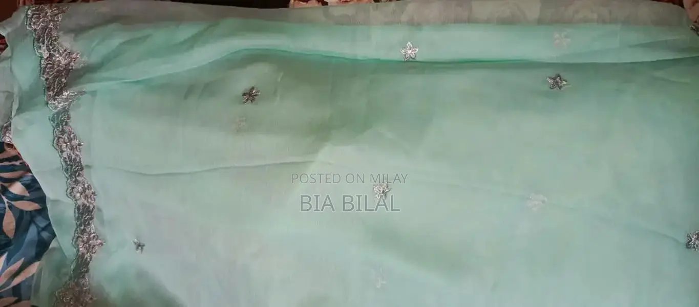 Elegant Black Dress with Aqua and Silver Embroidery