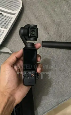 Photo - DJI Osmo Pocket 3 Professional Handheld Camera Stabilizer