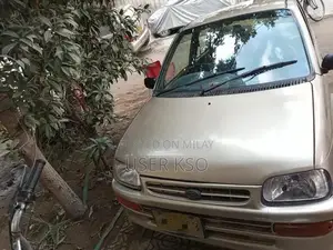 Photo - Daihatsu Coure CX CNG Compact City Car - Reliable Economical Vehicle