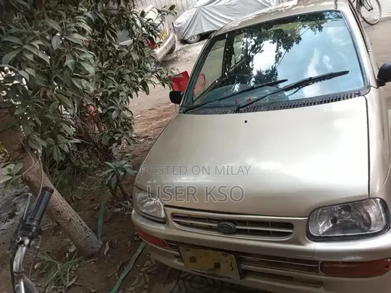 Daihatsu Coure CX CNG Compact City Car - Reliable Economical Vehicle