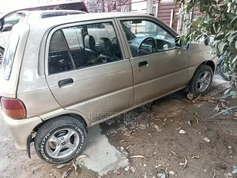 Daihatsu Coure CX CNG Compact City Car - Reliable Economical Vehicle