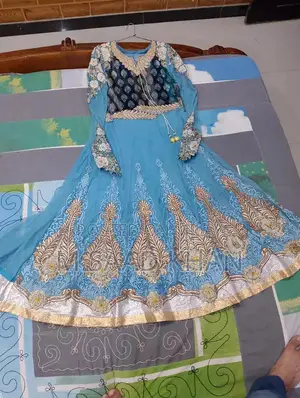 Elegant Net Frock with Stone and Karahi Embellishments