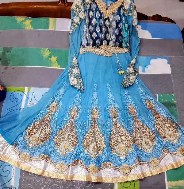 Elegant Net Frock with Stone and Karahi Embellishments