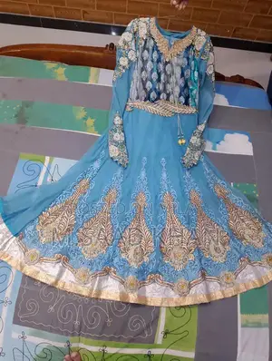 Elegant Net Frock with Stone and Karahi Embellishments