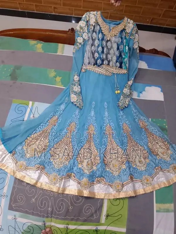 Elegant Net Frock with Stone and Karahi Embellishments