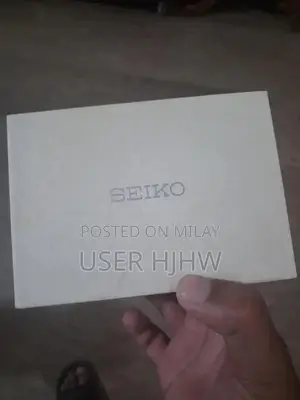 Seiko Gold-Tone Men's Analog Dress Watch with Stainless Steel Case