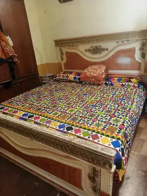 Photo - Wooden Dresser with Wear - Potential Restoration Project