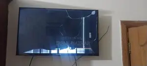 Photo - Smart TV with Damaged Display Panel and Functioning Components