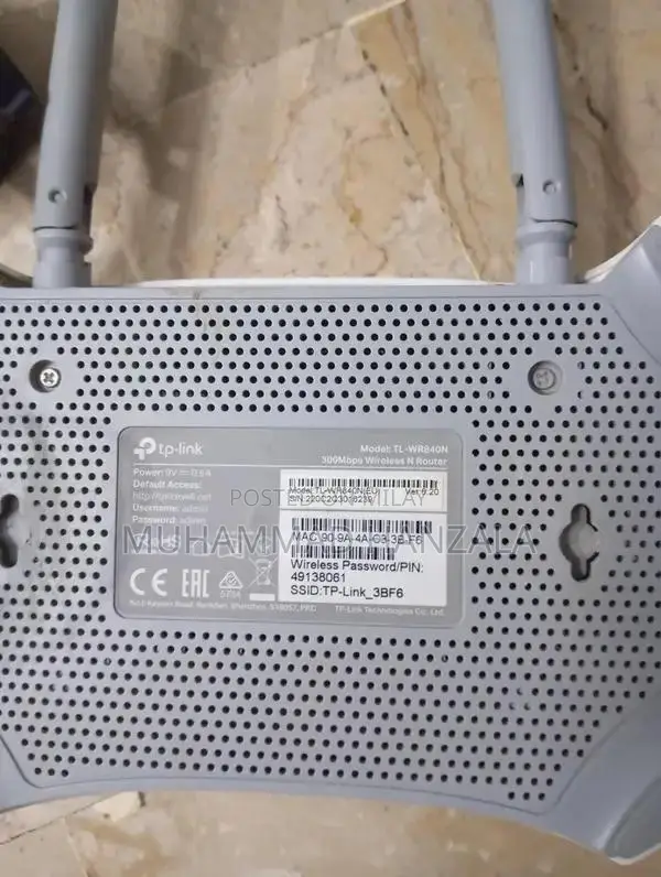 TP-Link Router with Power Adapter and Original Packaging