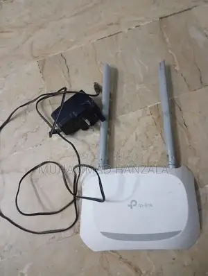 TP-Link Router with Power Adapter and Original Packaging