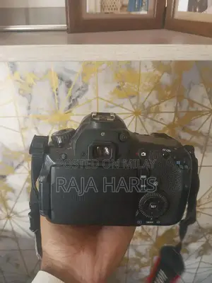 Photo - Canon 60D DSLR Camera with 18-55mm STM Lens for Video