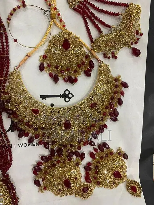 Elegant Reddish Maroon Bridal Dress with Complete Jewelry Set