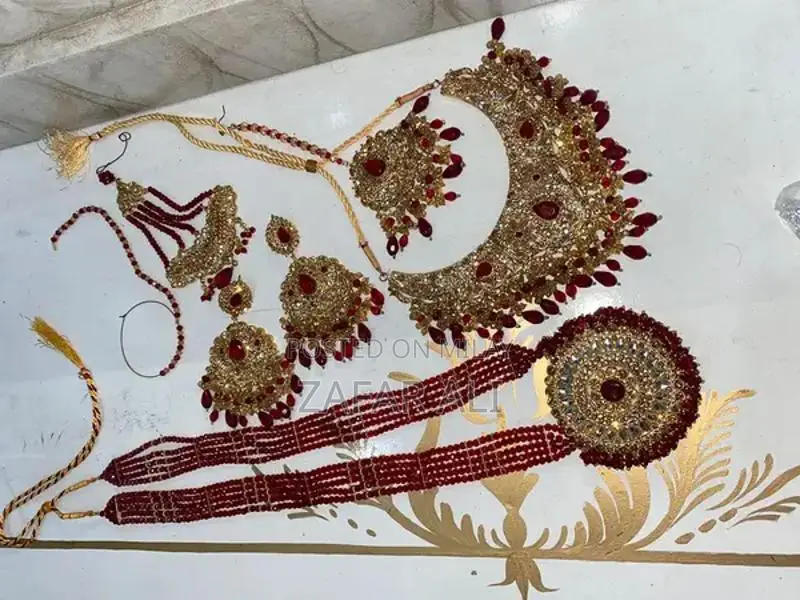 Elegant Reddish Maroon Bridal Dress with Complete Jewelry Set