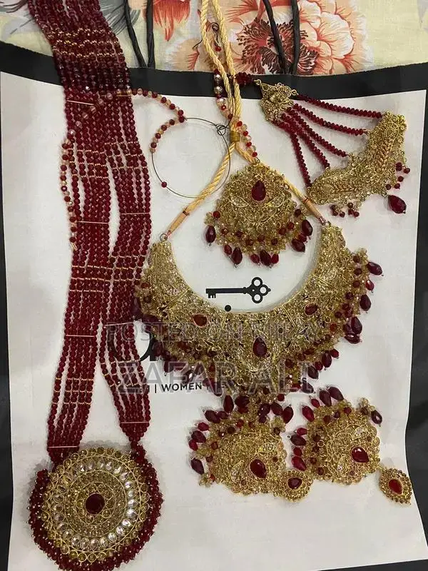 Elegant Reddish Maroon Bridal Dress with Complete Jewelry Set