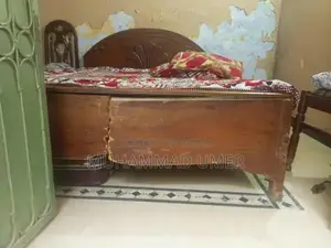 Photo - Used Double Bed with Minor Side Damage