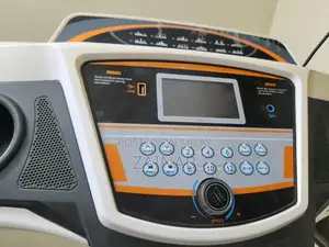 Photo - Compact Electric Treadmill for Home Fitness - Max User Weight 90kg