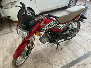 Photo - 2023 Honda CD 70 Dream Motorcycle - Red Low Mileage Bike