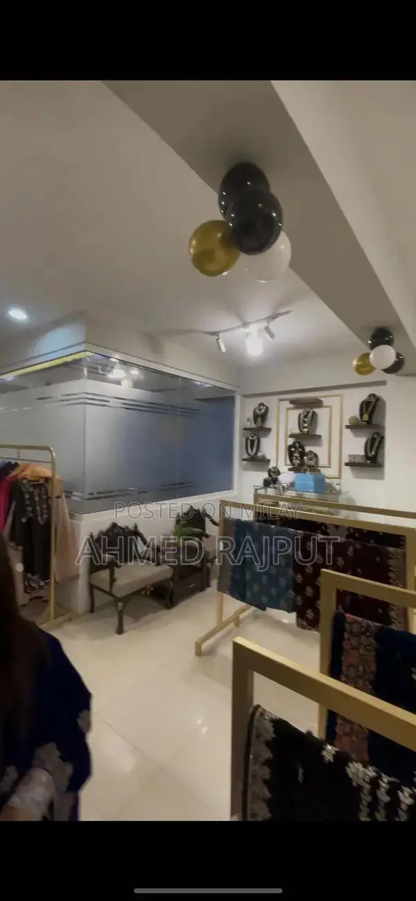 Professional Clothing and Makeup Studio Setup with Office Space