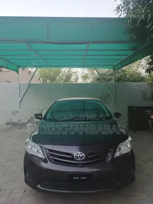 Photo - Toyota Corolla GLI Sedan - Well Maintained Compact Car