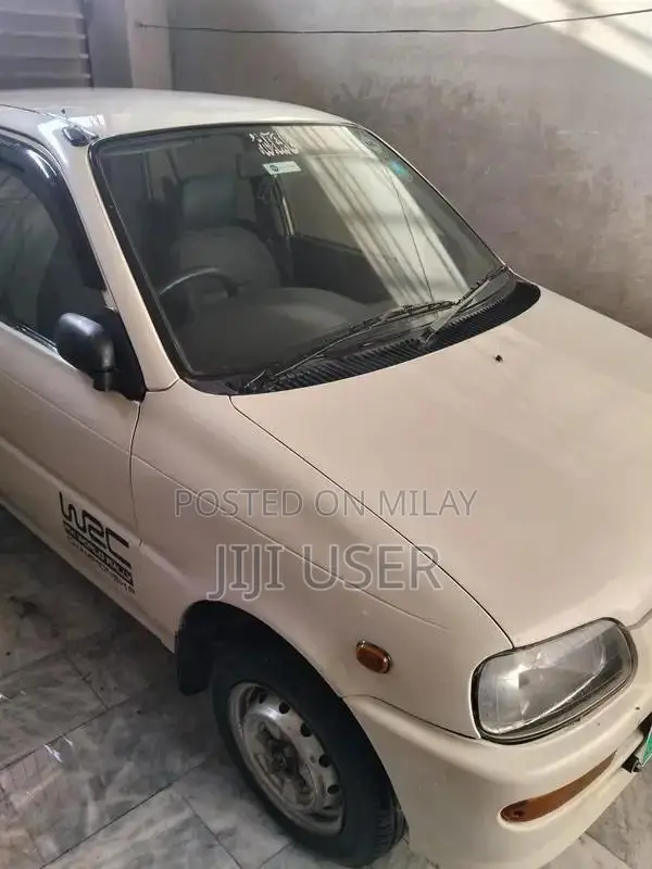 Daihatsu Cuore Compact City Car - Efficient Urban Vehicle